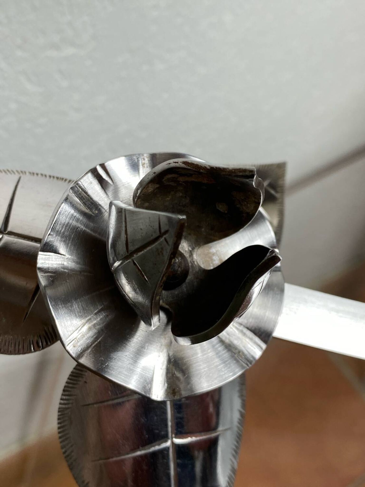 Silver-plated metal flower candle holder