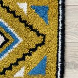 Tapis  vintage en laine jaune ocre Smyrna 97x50cm