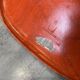 A vintage 70s Eames Herman Miller DSW Fiber Red Orange Dowel Walnut Chair