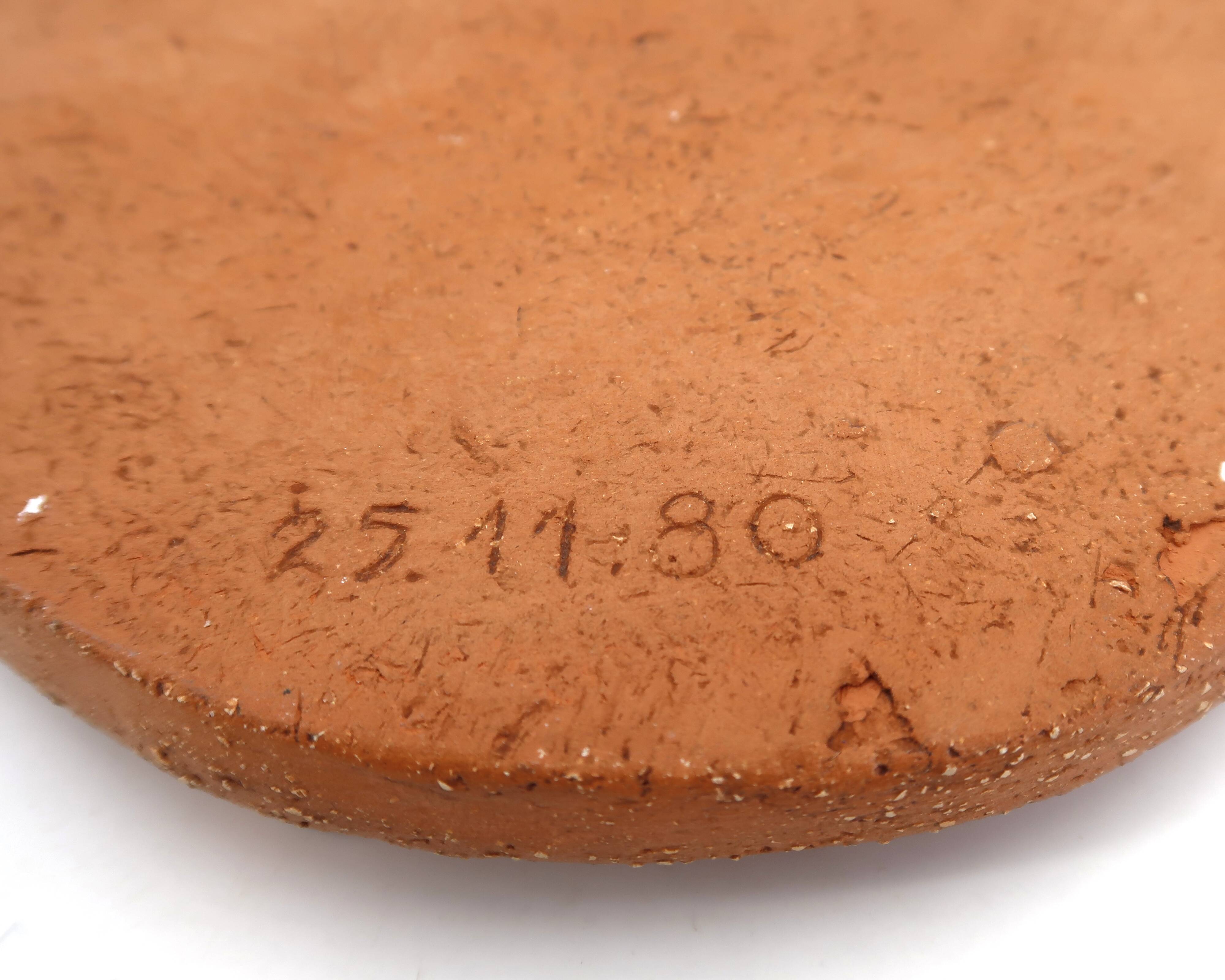 Round ceramic wall mask inspired by Africa, 1980s.