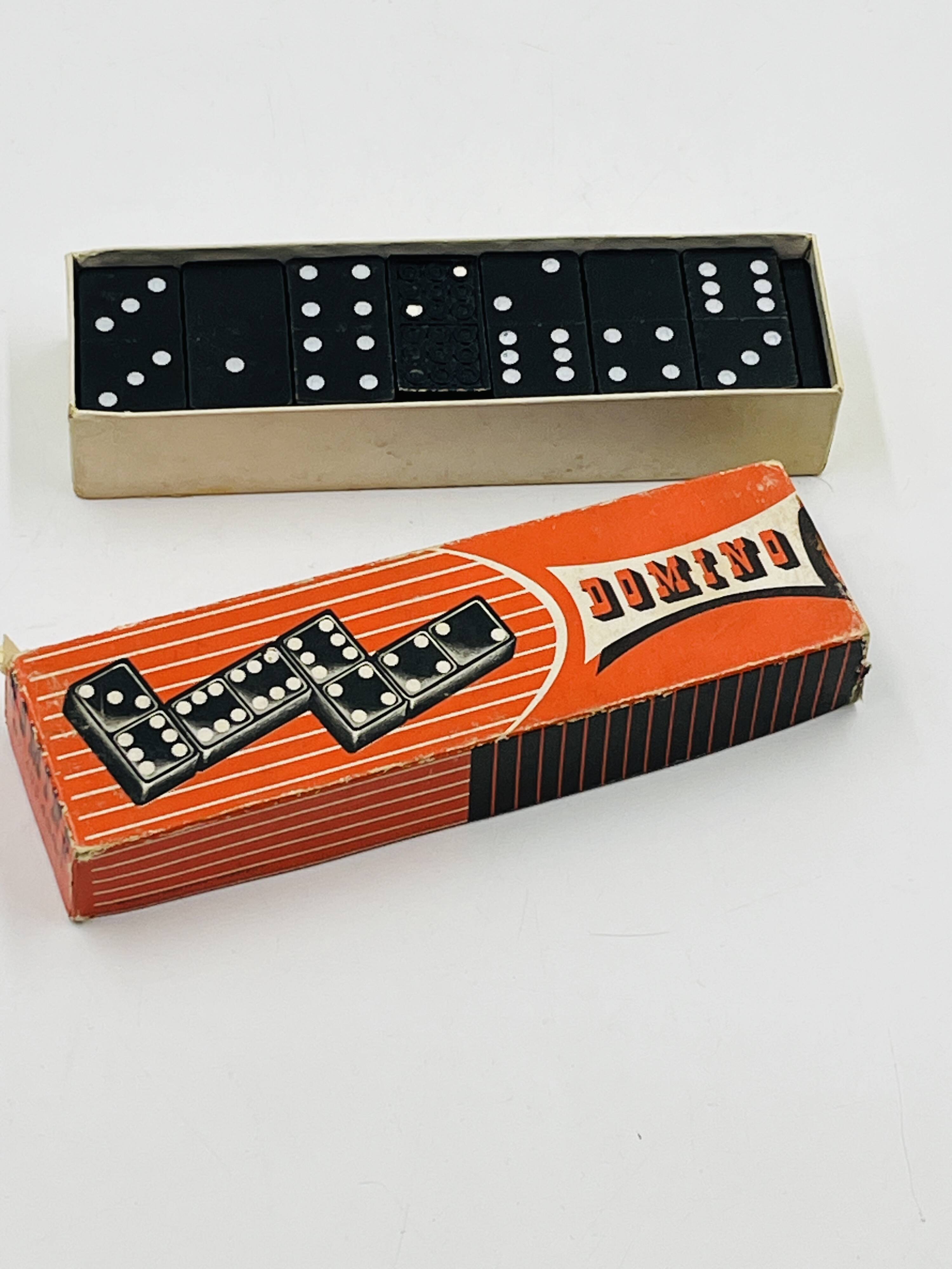 Complete vintage domino set with original box.