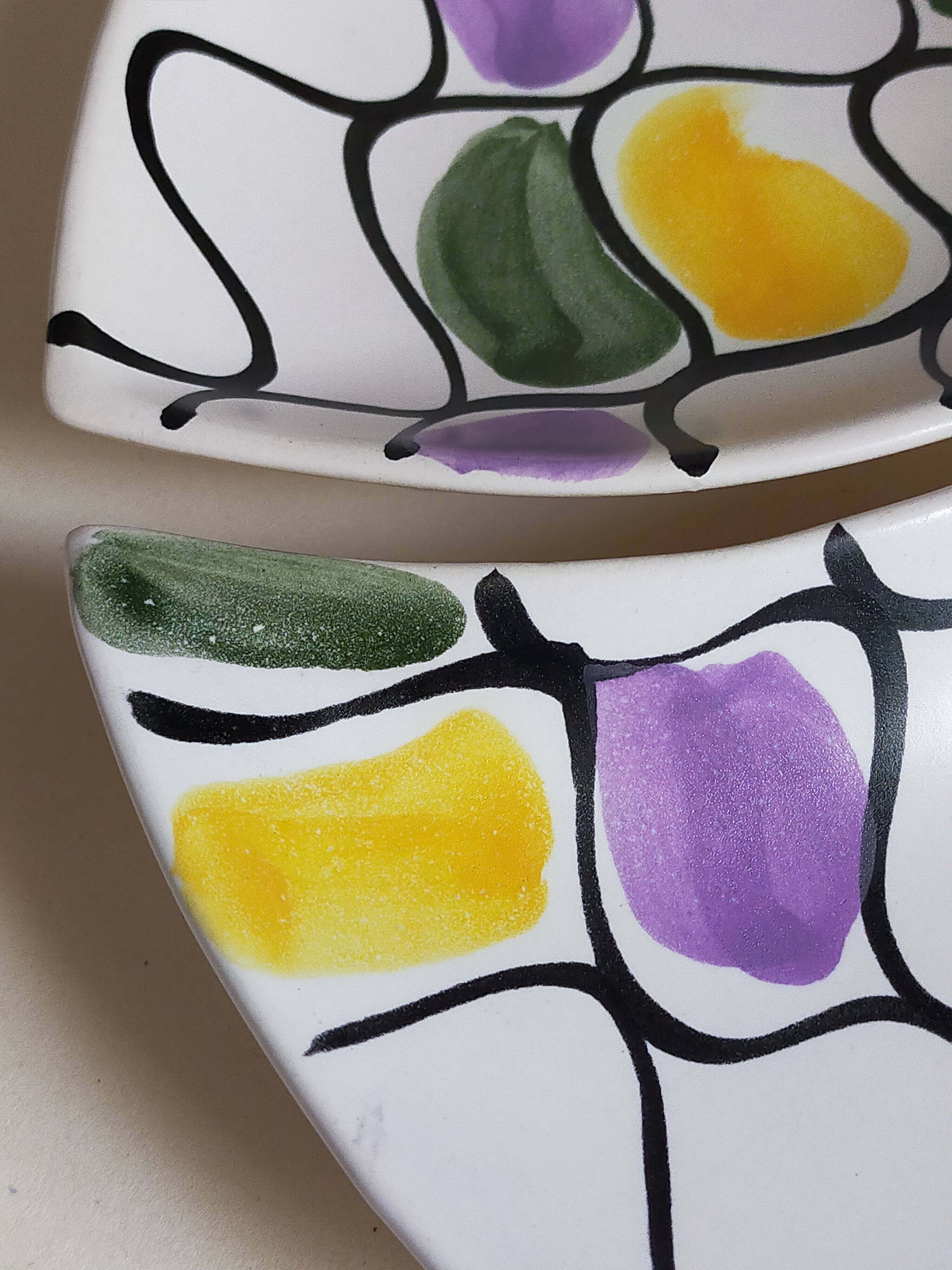 Three vintage free-form ceramic ravine dishes from the 1950s