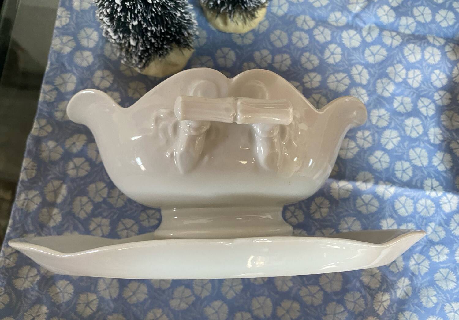 Antique porcelain gravy boat with bamboo motif