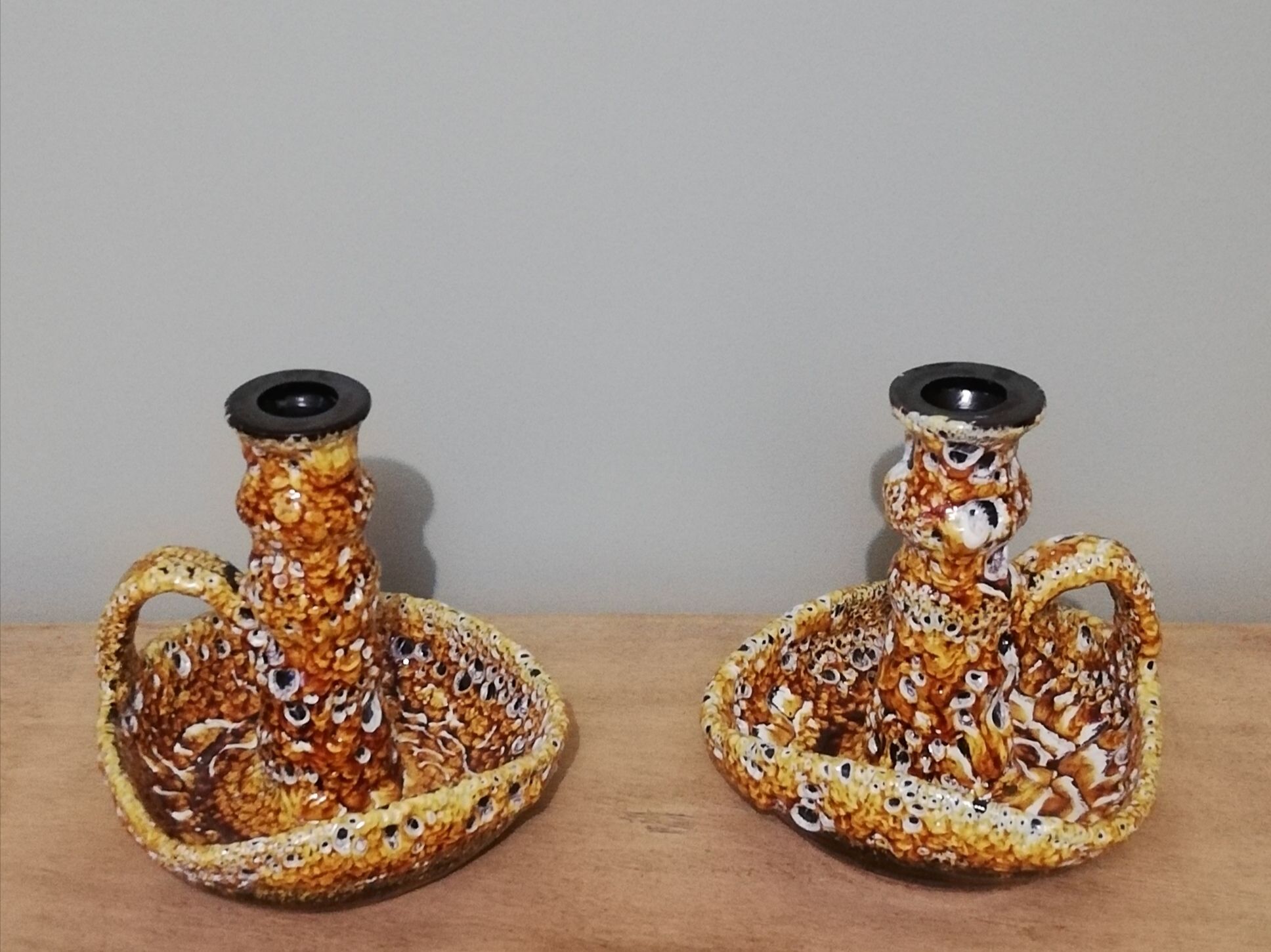 Pair of honey-colored Fat Lava ceramic candle holders