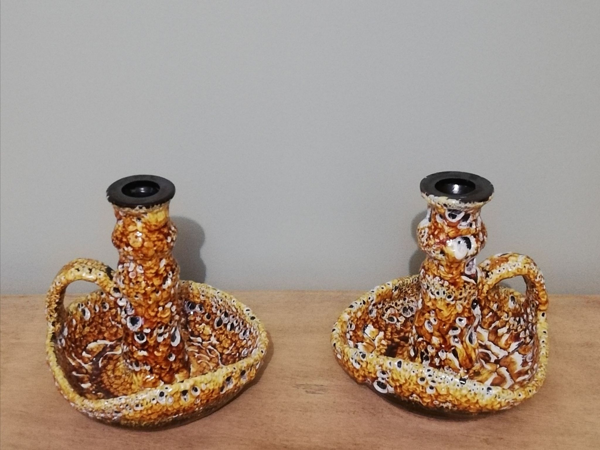 Pair of honey-colored Fat Lava ceramic candle holders