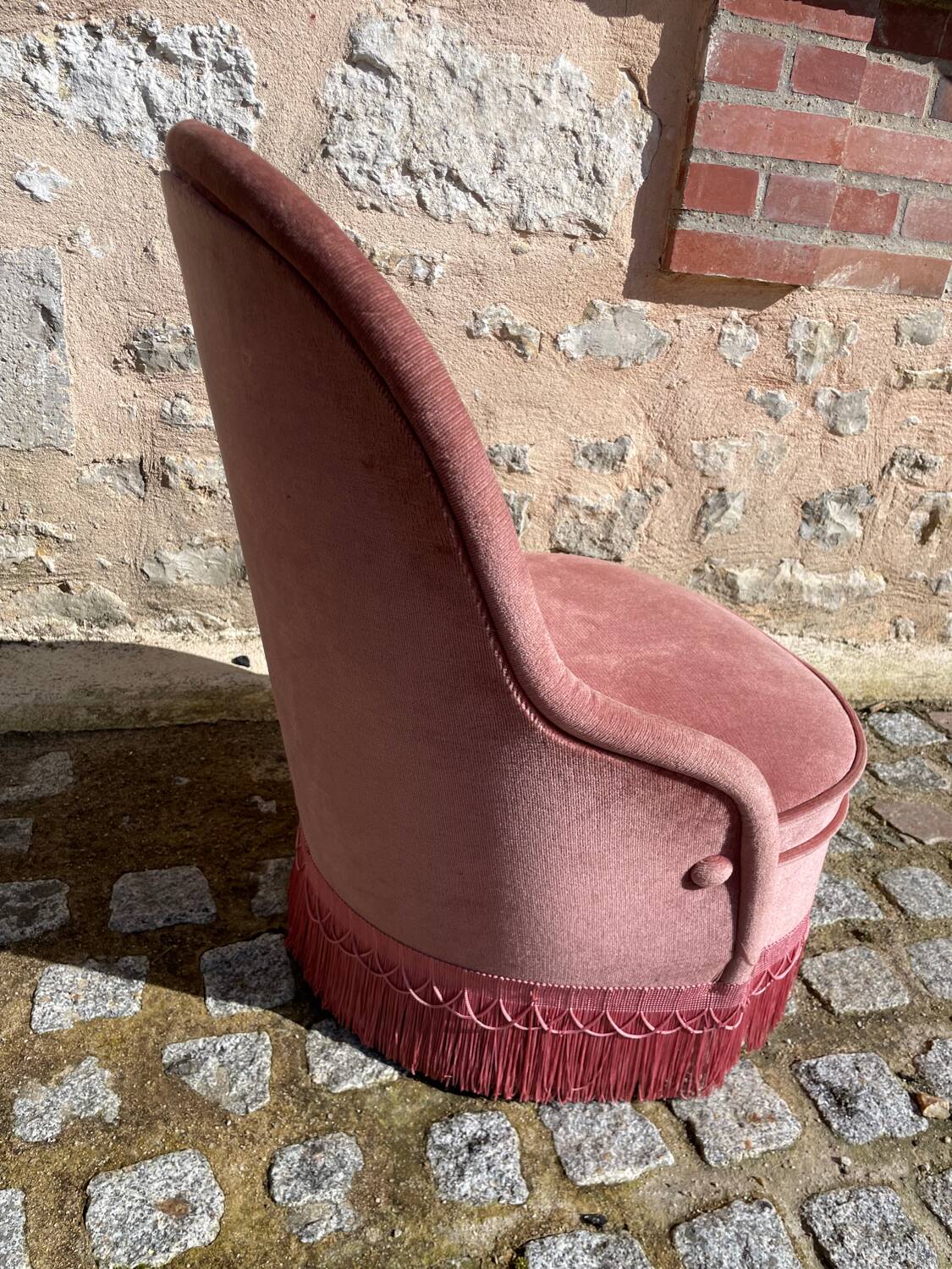 Pink velvet armchair