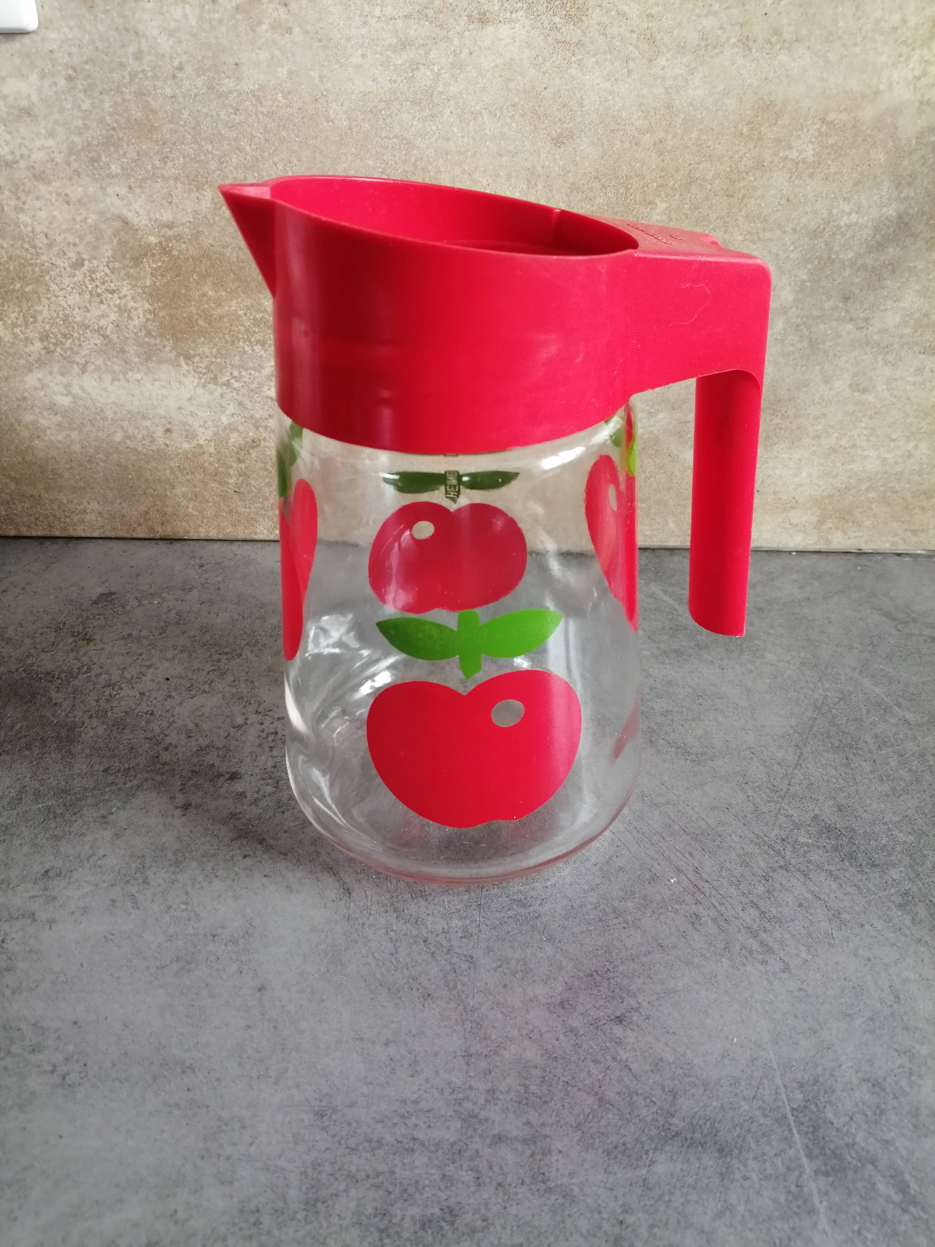 Henkel pitcher, glass with spout