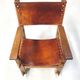 Chaise de château brutaliste ancienne faite à la main en chêne et cuir cognac, années 1920.