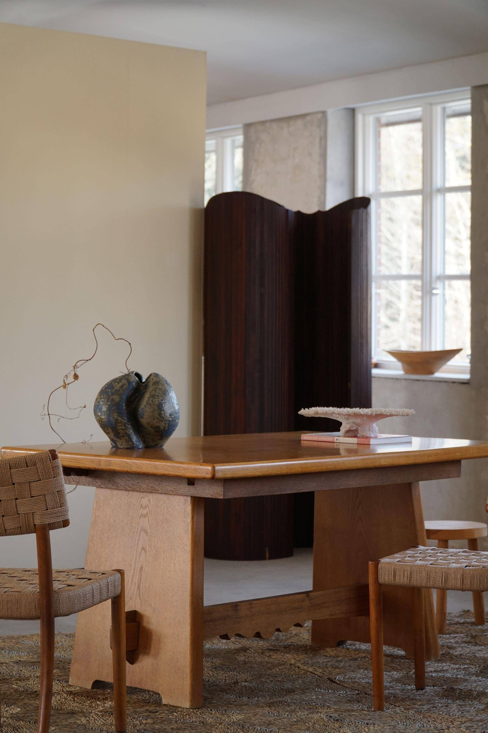 Mid-century brutalist dining table, made of oak, Danish craftsmanship, 1950s.