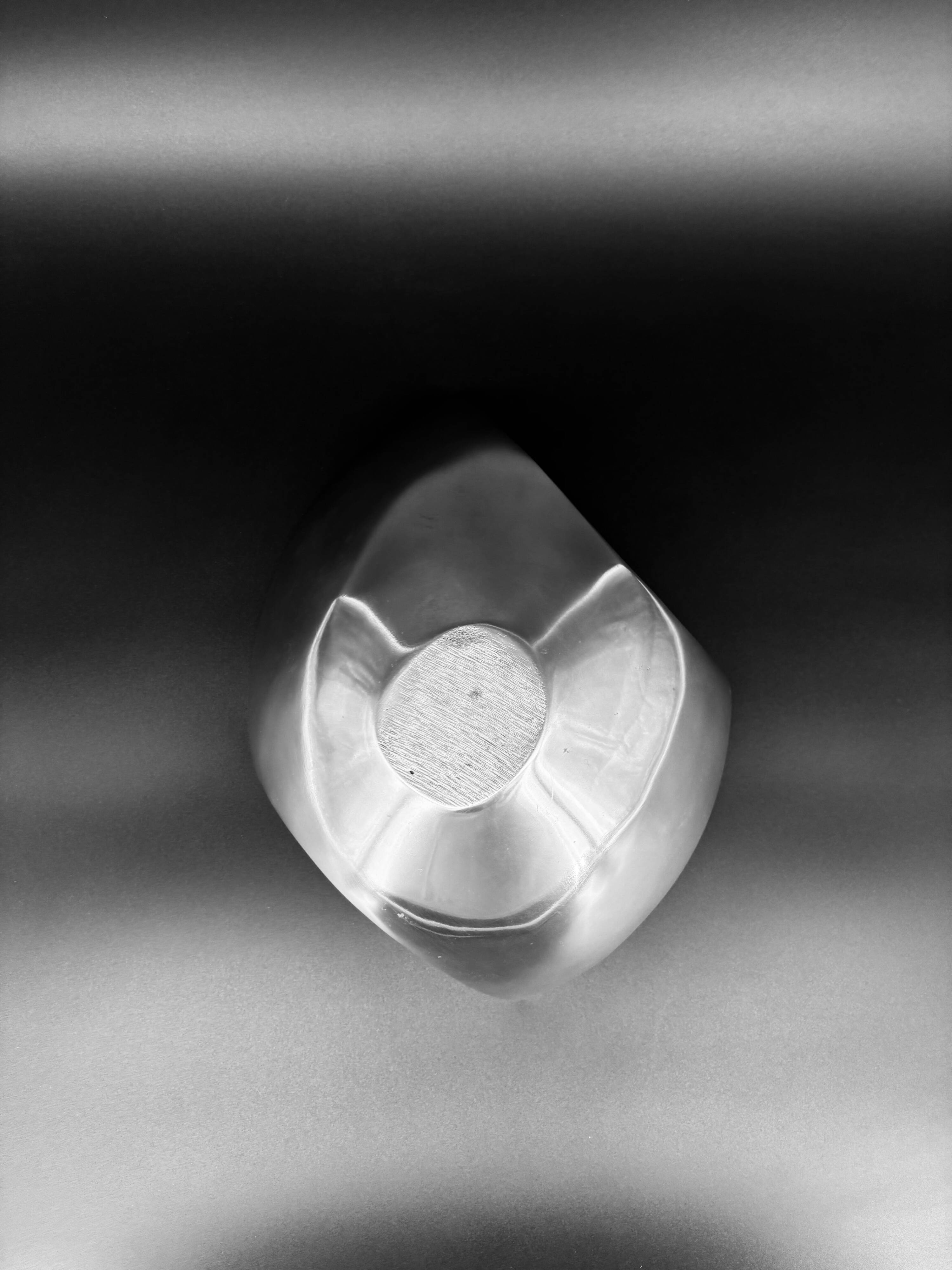 Sculptural polished aluminium bowl, in the style of Michael Lax, 1970s.