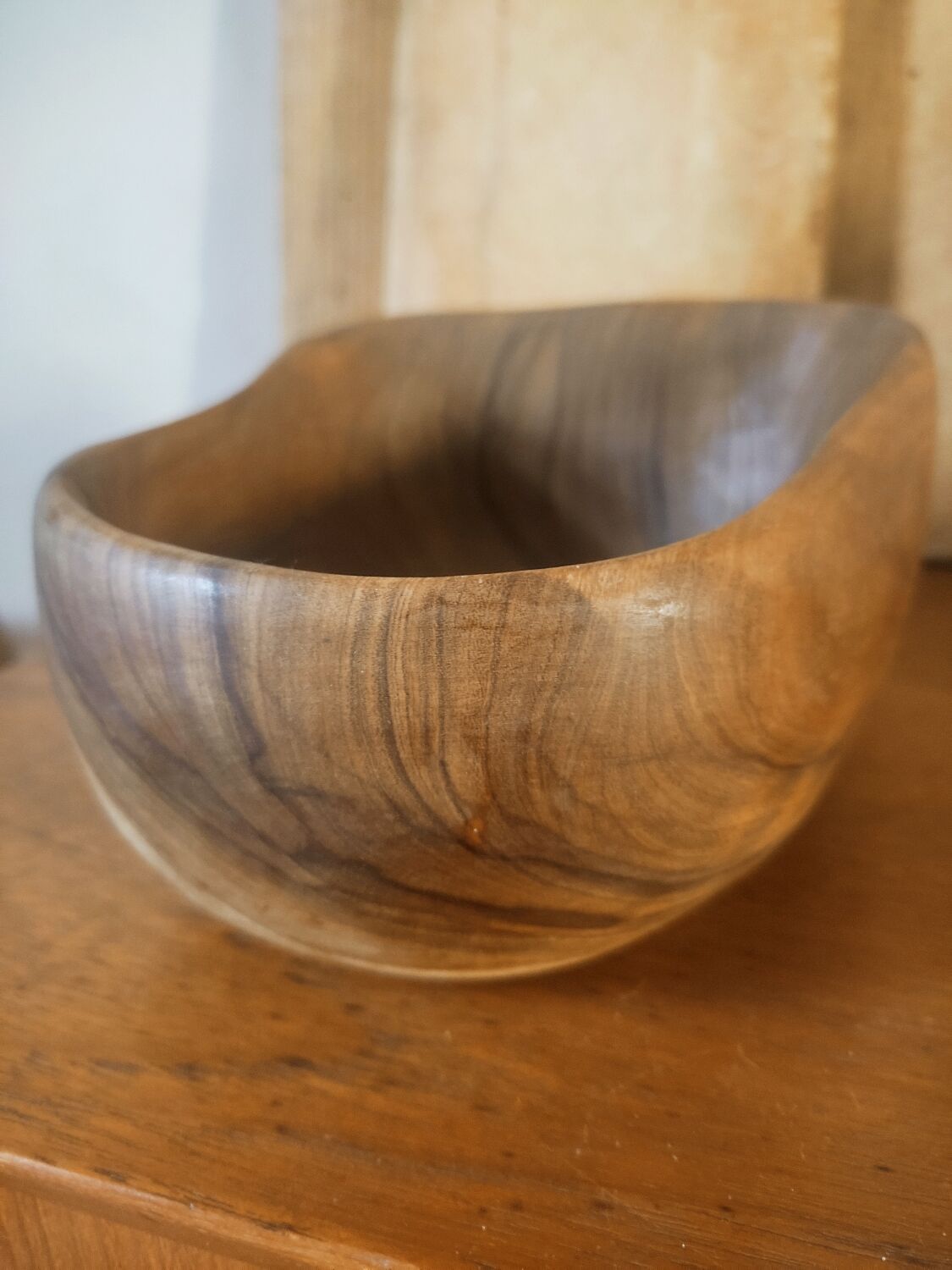 Empty pocket in olive wood