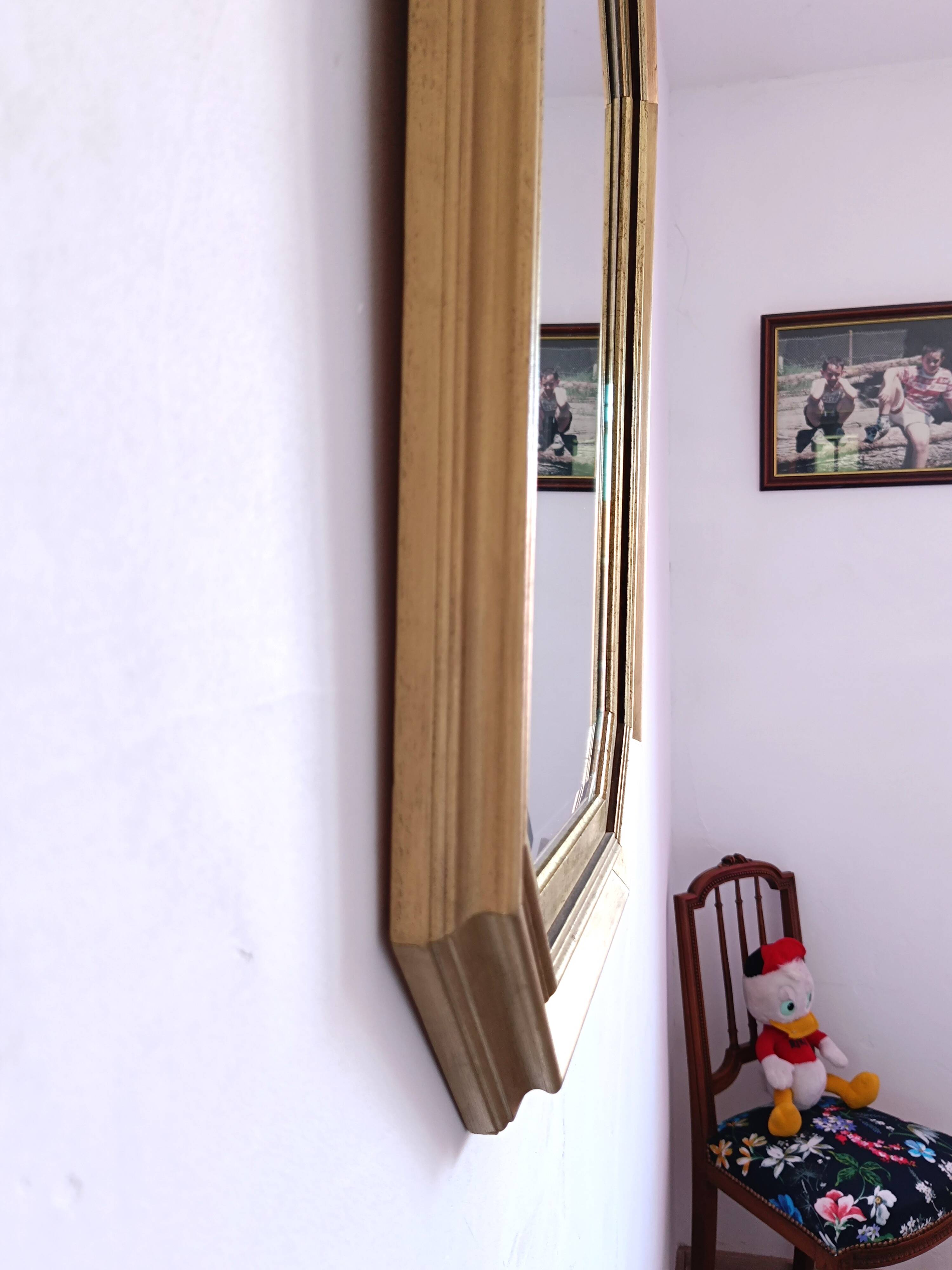 Octagonal gilded wooden mirror