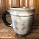 Set of 4 beige ceramic mugs fleur de lys vintage