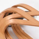Vincent Gonzalez: sculpted curved wood wall light, 1970s design