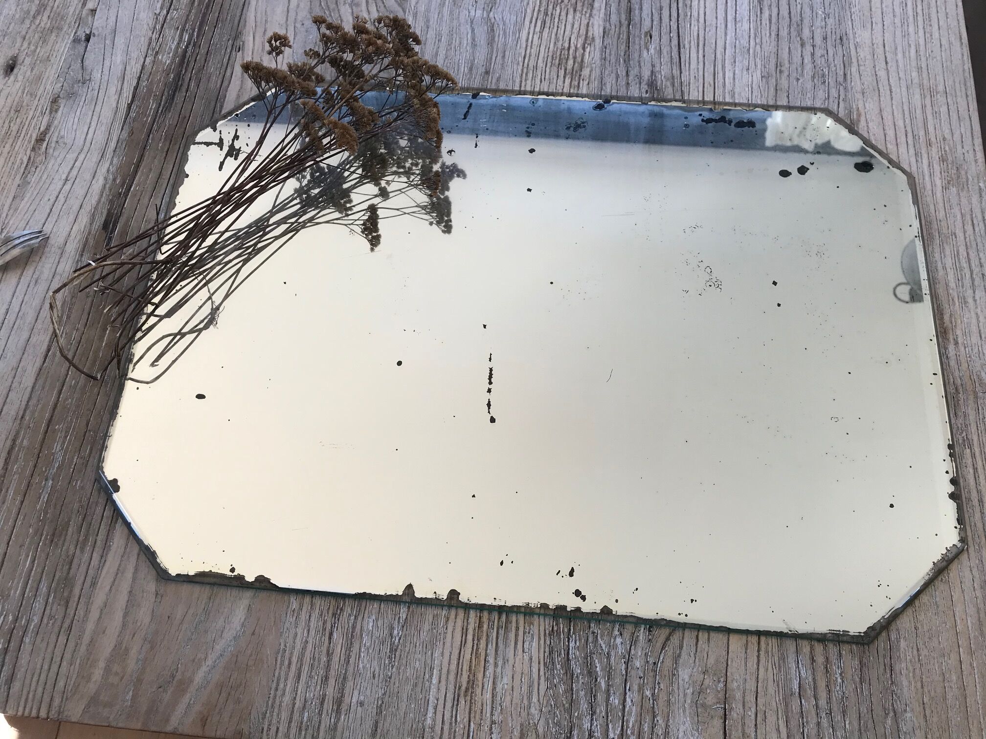 Old octagonal beveled mirror