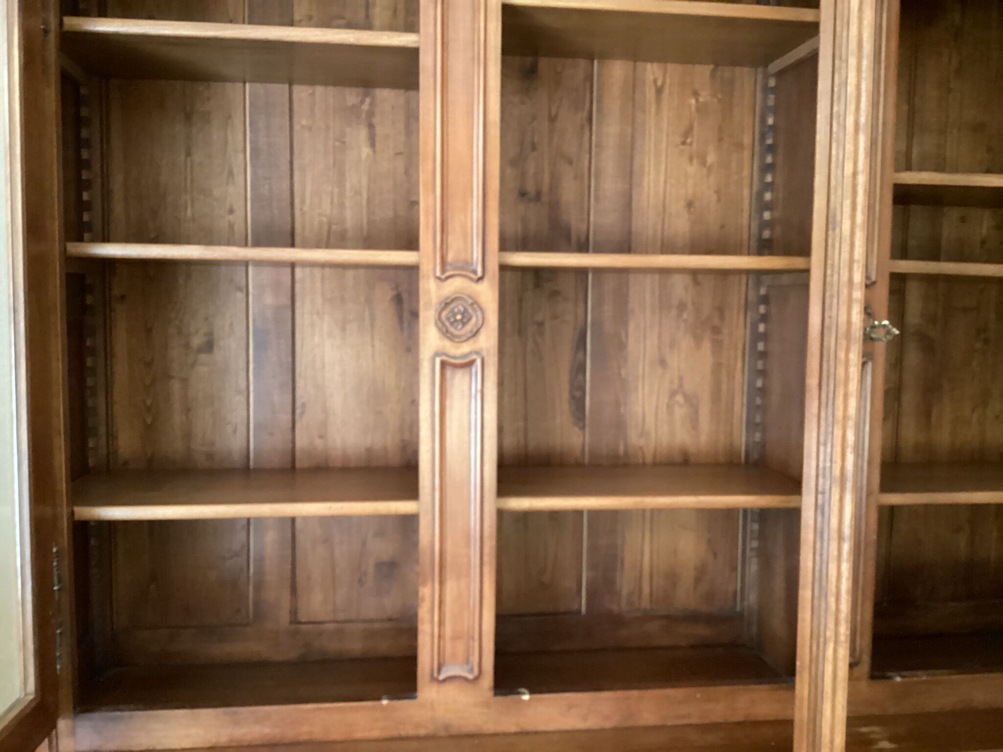 Cherry bookcase stamped Louis Tricoire