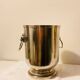 Silver-plated champagne bucket with lion heads from the 20th century, stamped.
