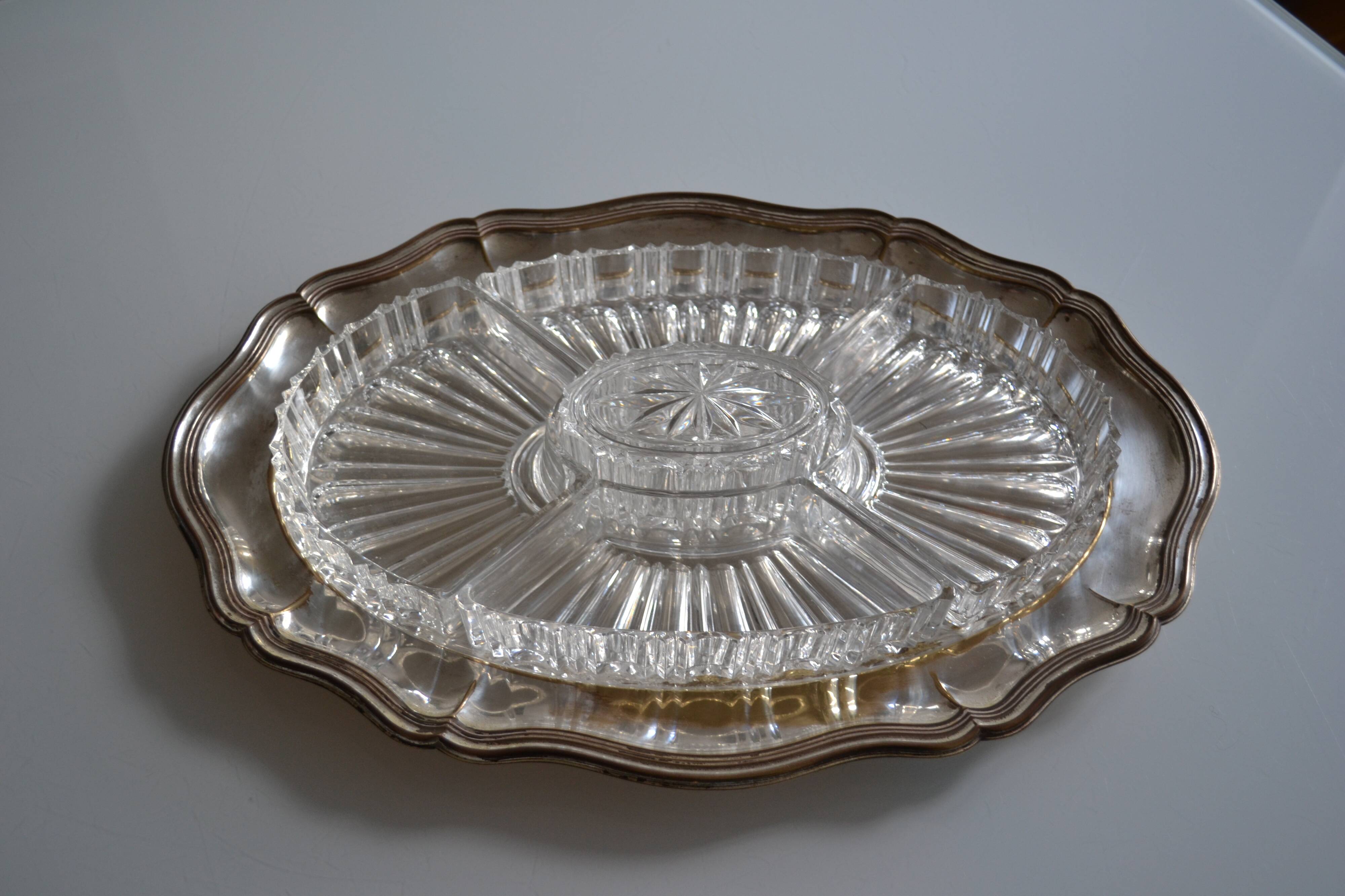 Silver-plated metal aperitif serving tray with HKE hallmark and glass.