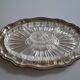 Silver-plated metal aperitif serving tray with HKE hallmark and glass.