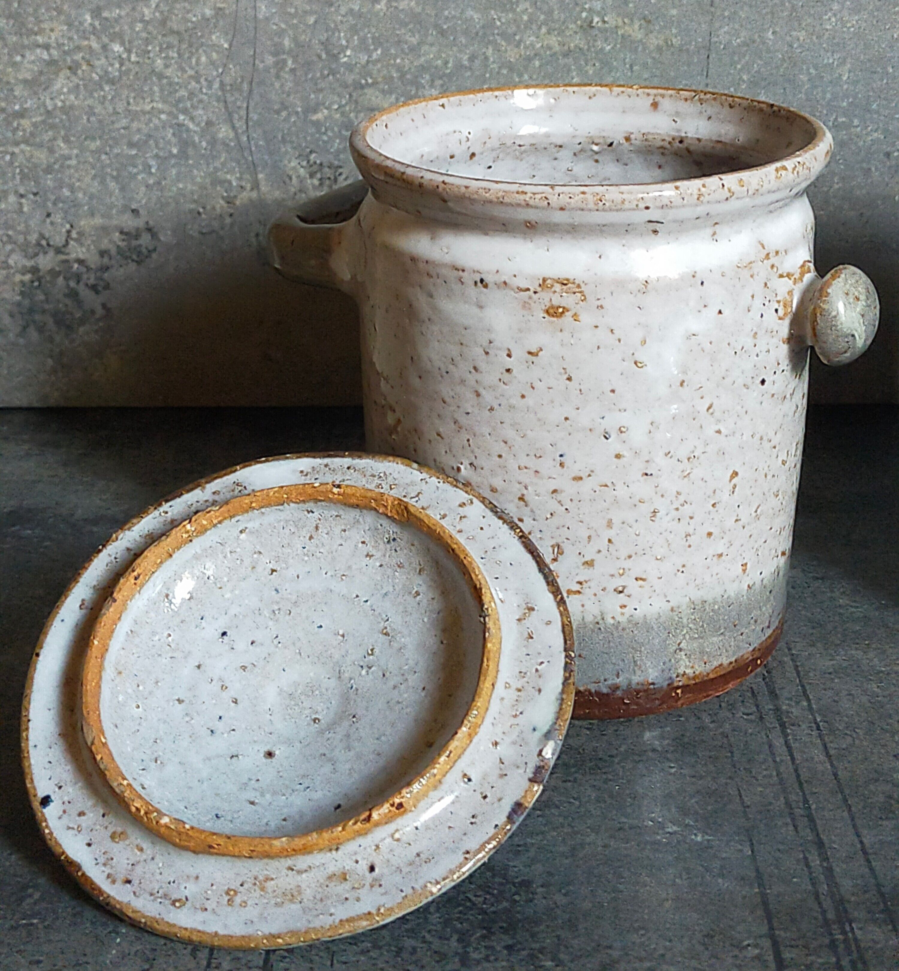 Duo of potter's pots covered in vintage glazed stoneware