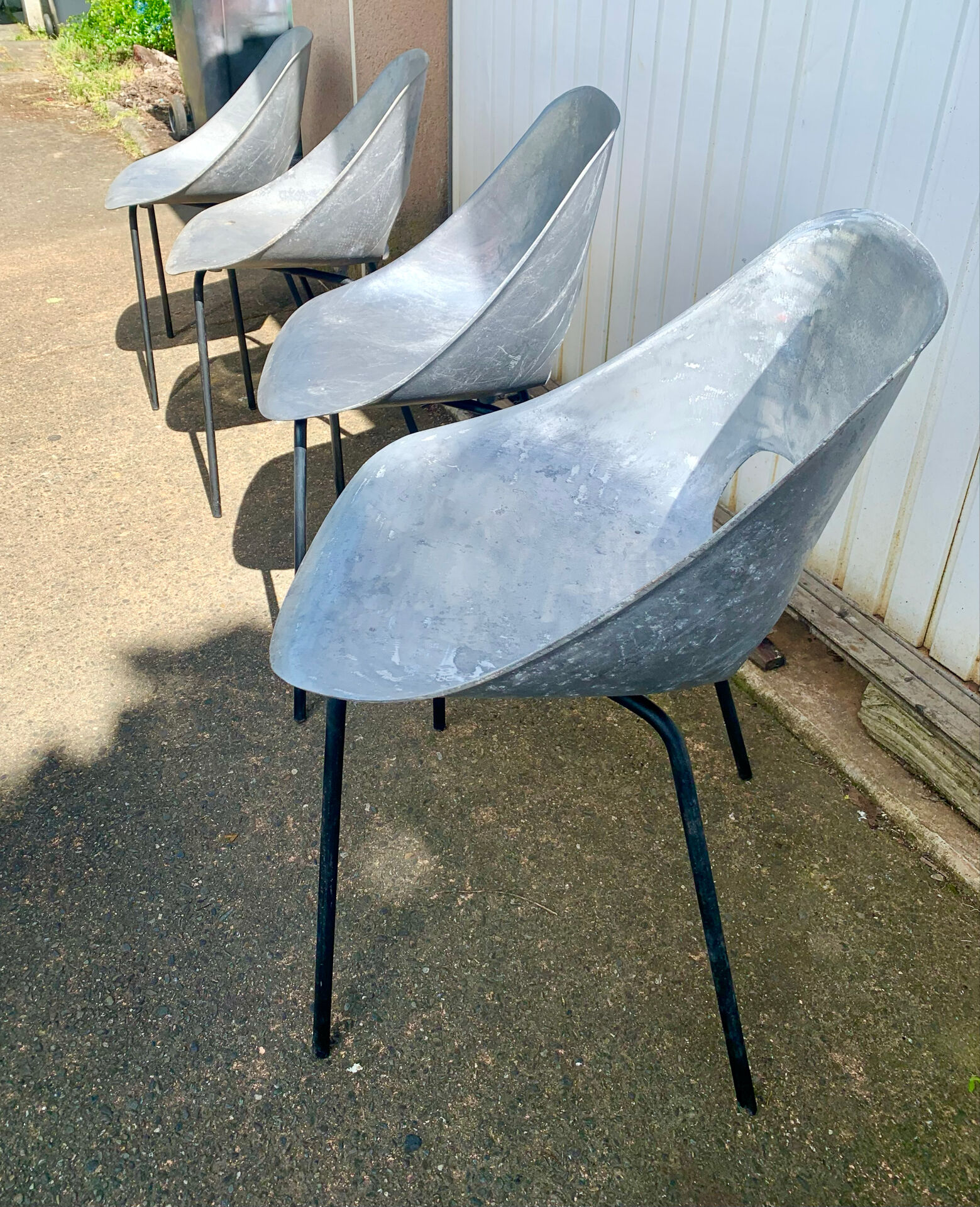 Four chairs 1953 Tonneau model design by Pierre Guariche Co.