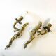 A pair of rococo gilded wall lights