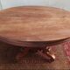 English oval table with 19th century mahogany extensions