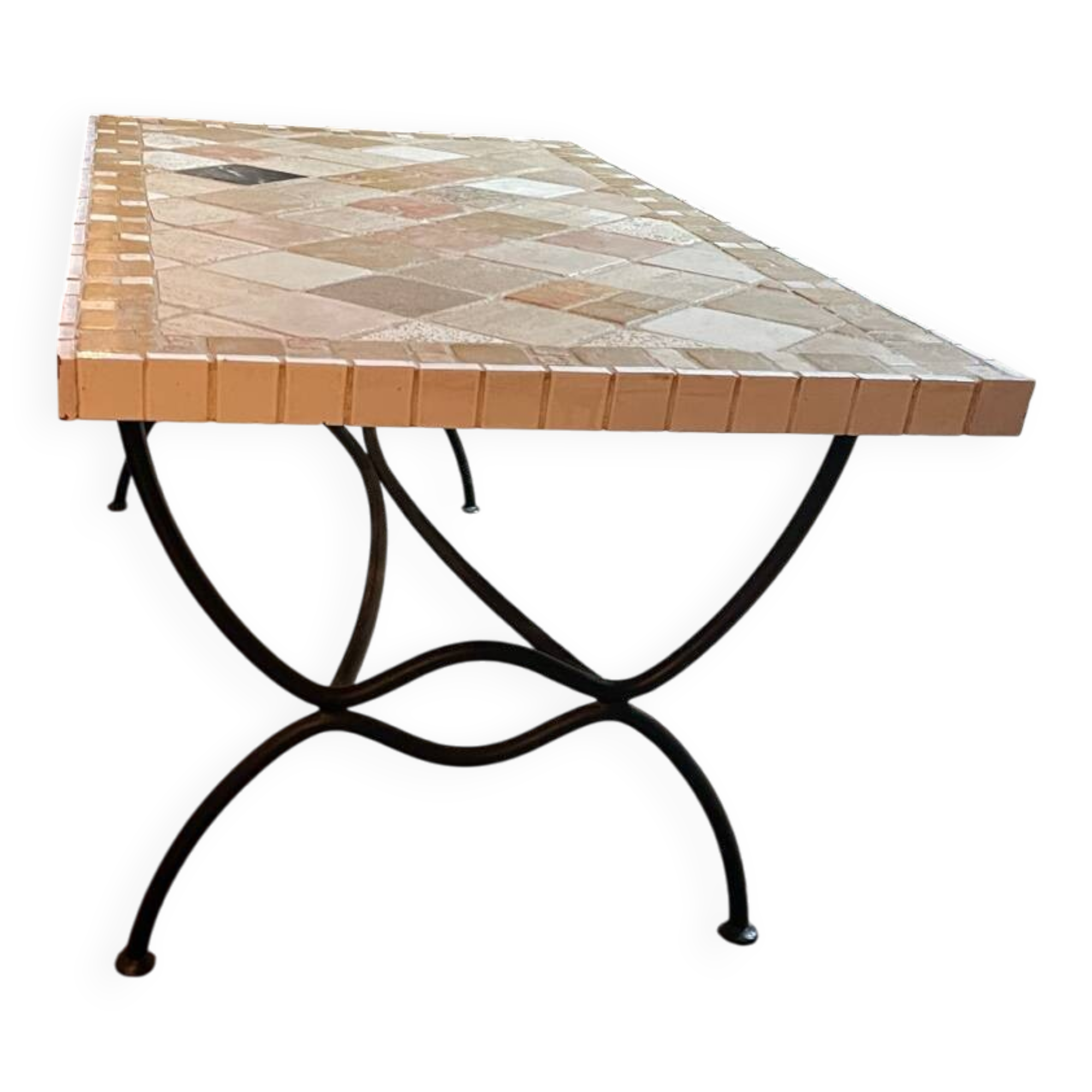 Beige ceramic coffee table with black metal legs.