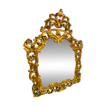 Antique wall mirror in carved and gilded wood, baroque style, 140 × 115 cm