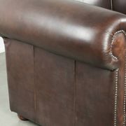 Set of a smooth chesterfield sofa and armchair with a timeless English look