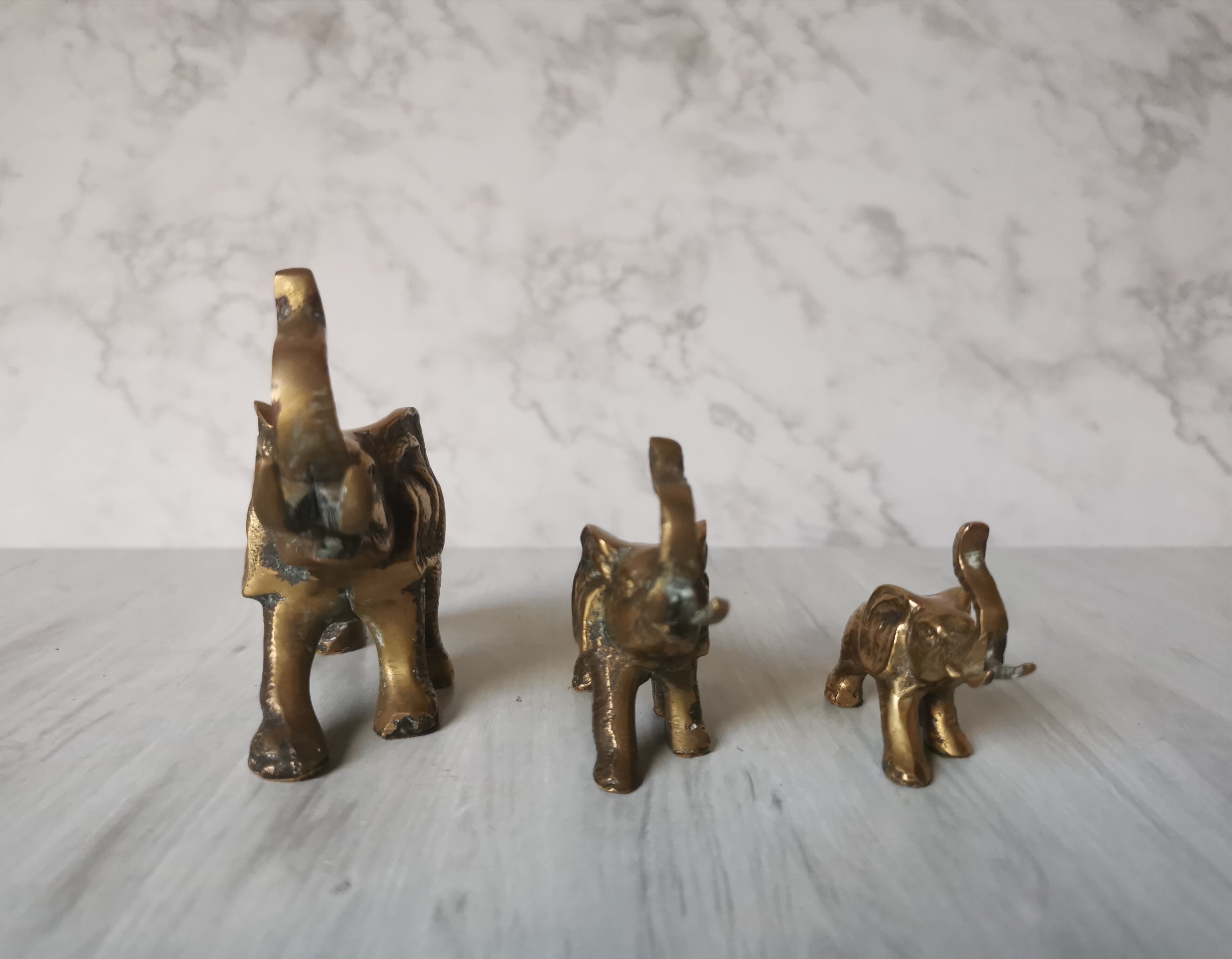 Trio of brass elephants