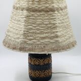 Vintage ceramic lamp with relief and wool shade.