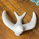 Pair of plaster swallows