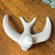 Pair of plaster swallows