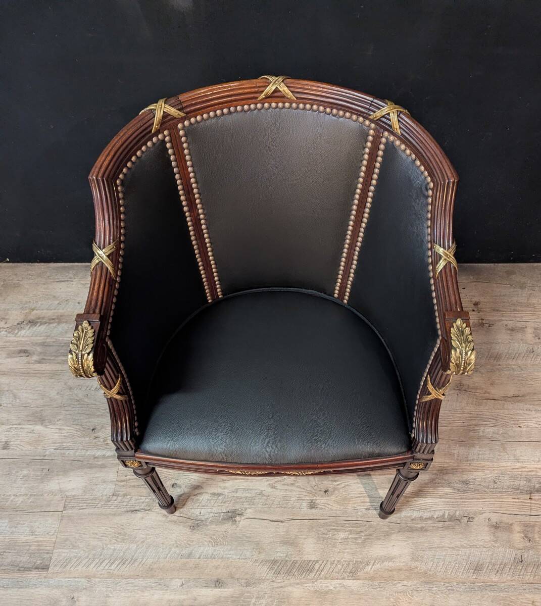 Louis XVI style office chair in mahogany and gilded bronze