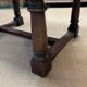 English monastery table with extensions from the late 19th century in elm and oak.