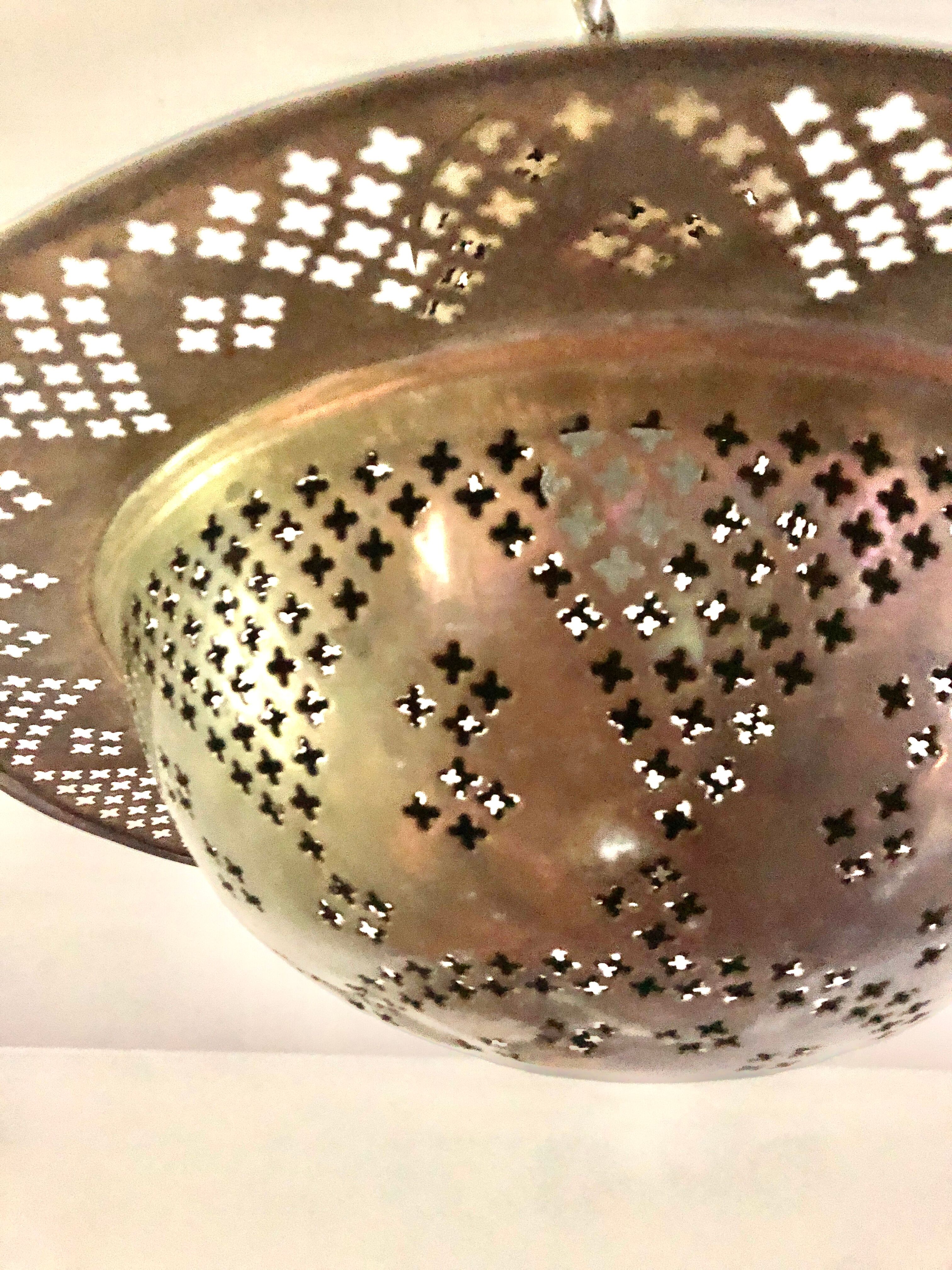 Perforated gilded metal lantern