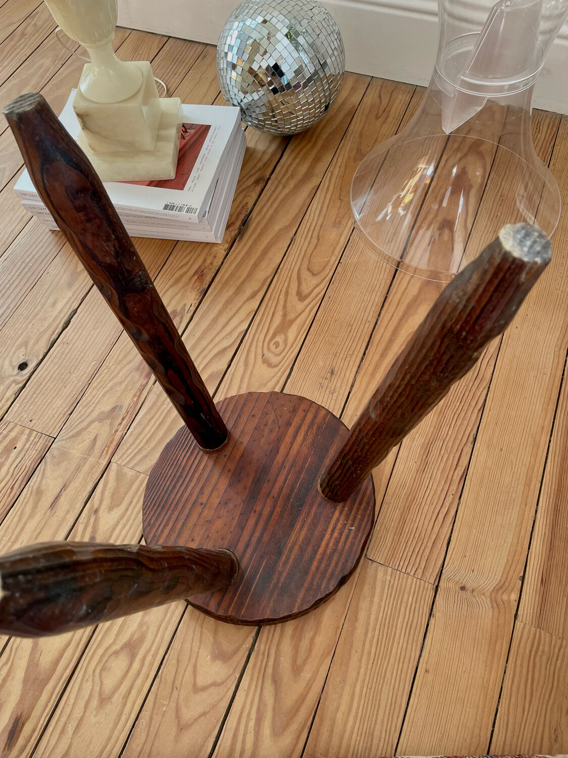 Dark wood tripod stool