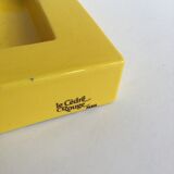 Large yellow ashtray
