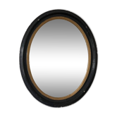 Large antique French Louis Philippe oval mirror – black and gold, late 19th century