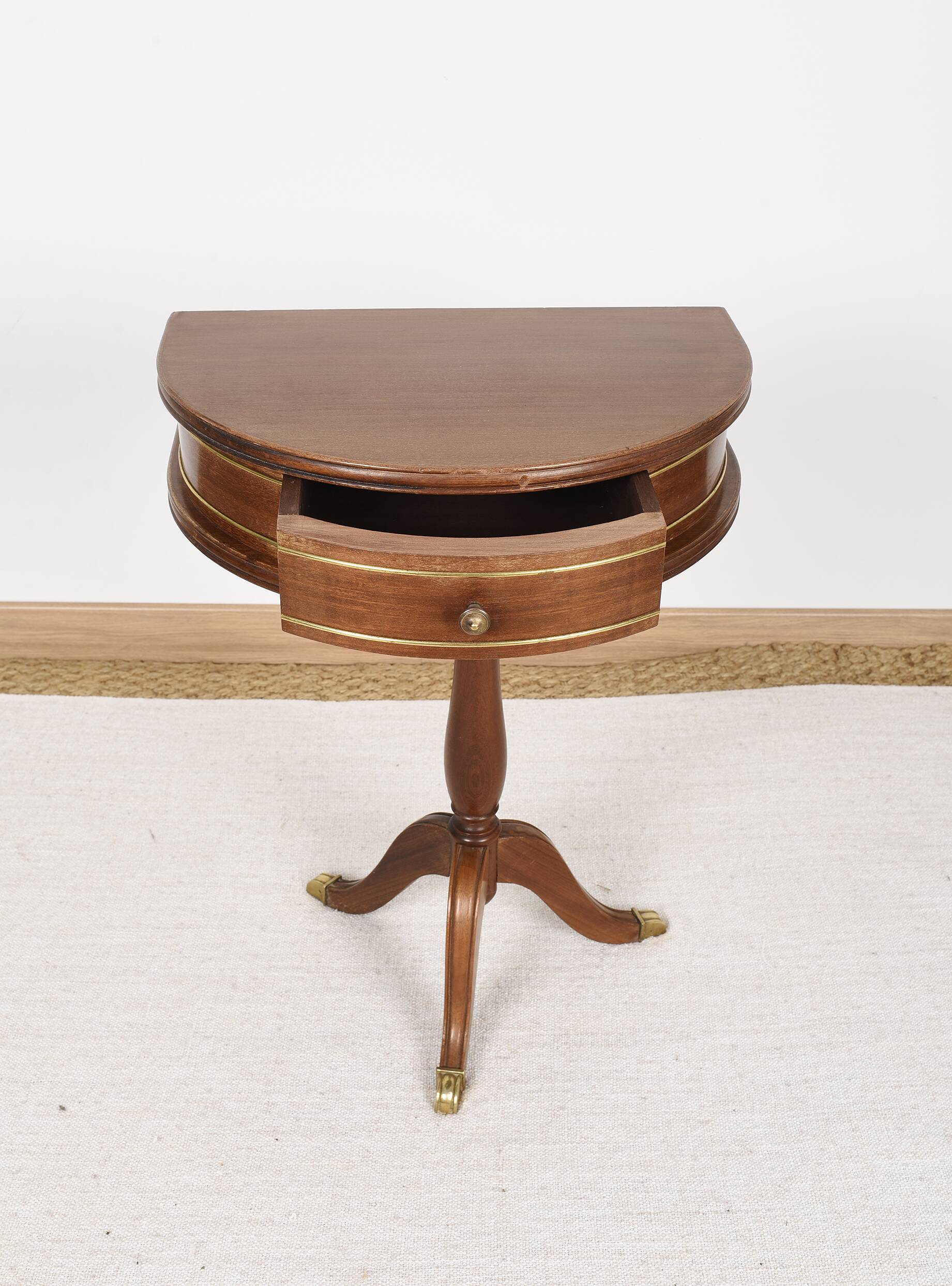 Pedestal table or small side table with drawer.