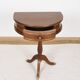 Pedestal table or small side table with drawer.