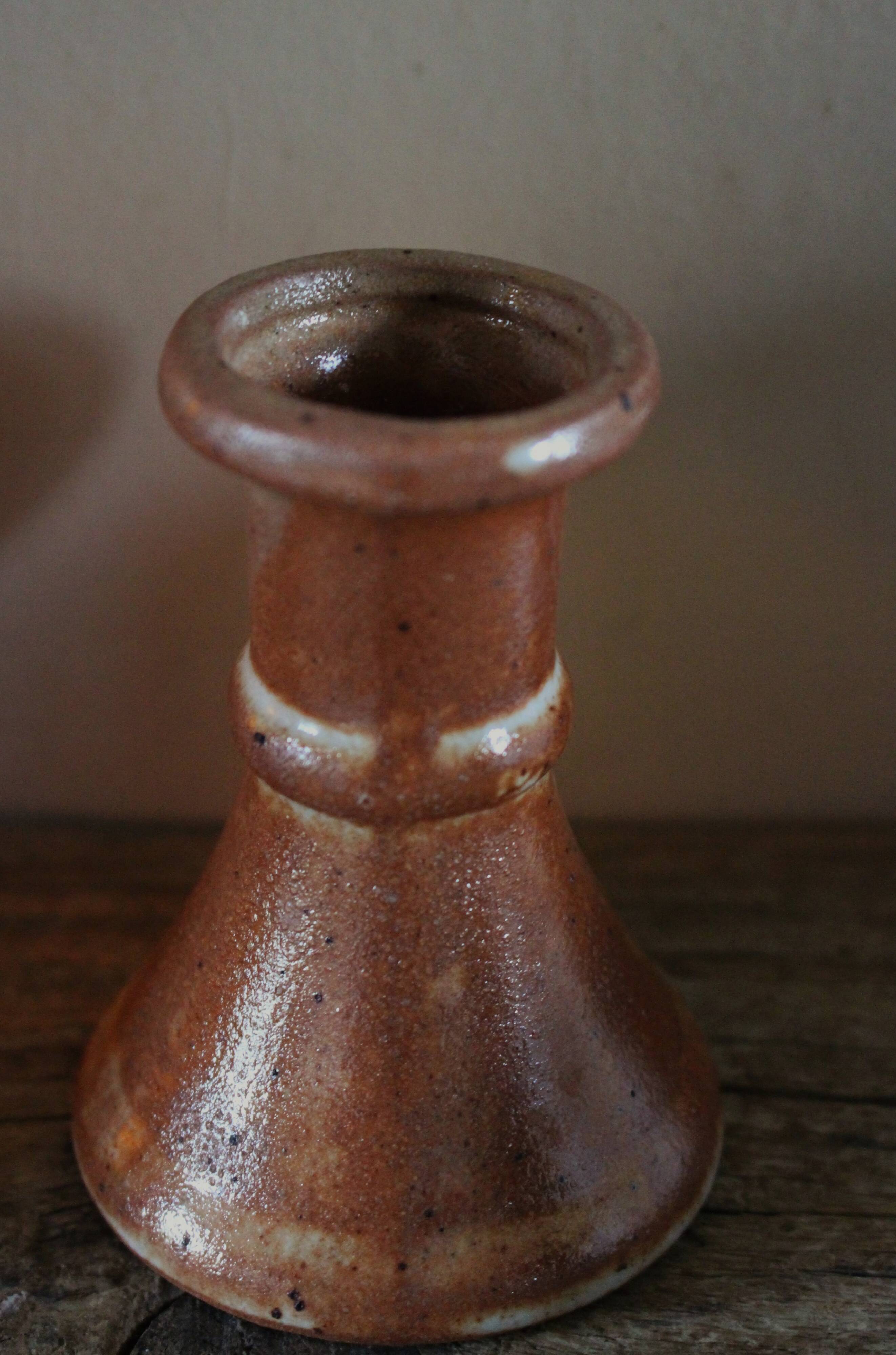 Small vintage marbled stoneware candlestick with handle