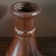 Small vintage marbled stoneware candlestick with handle
