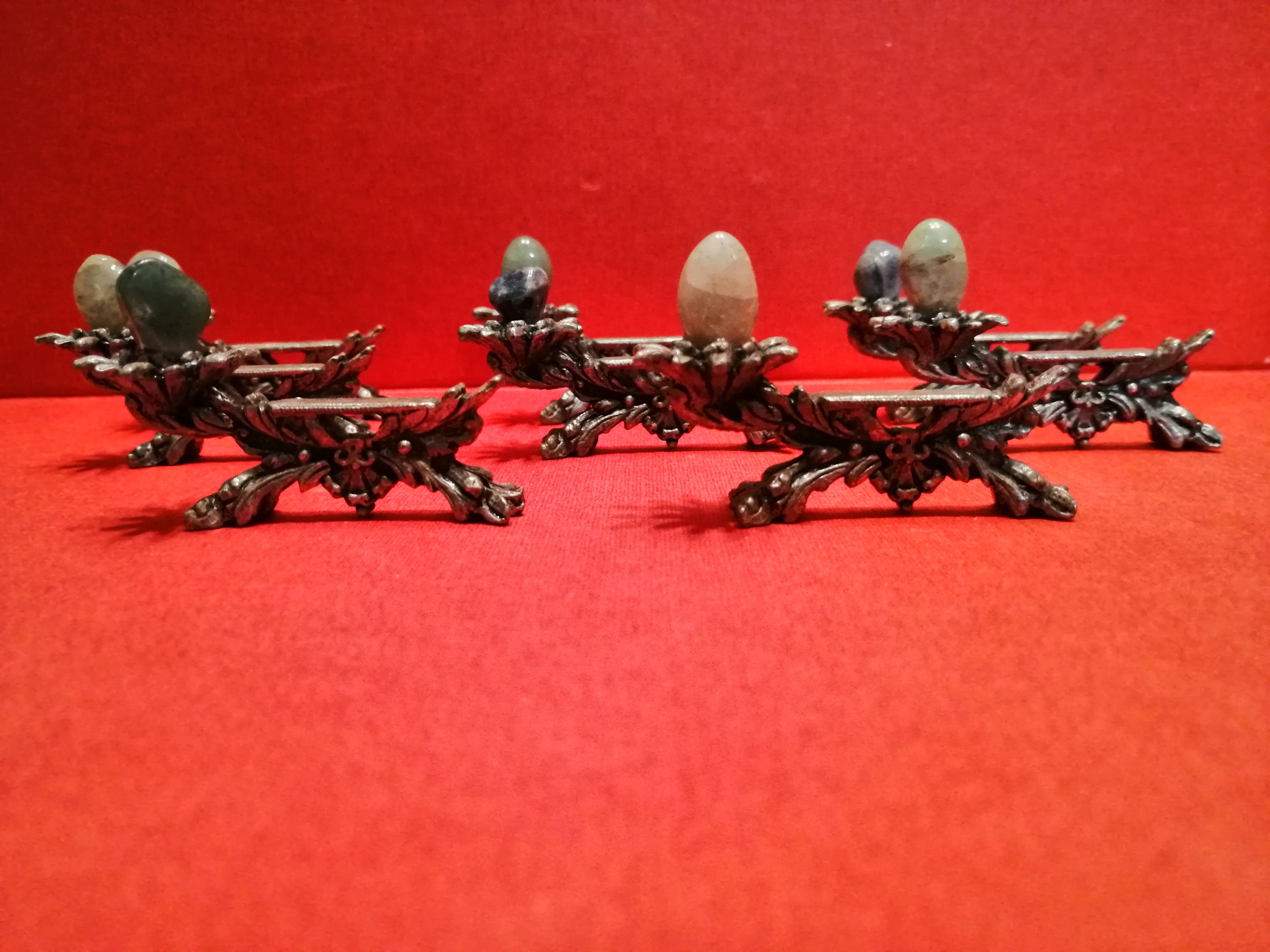 Set of 8 metal knife doors decorated with a stone