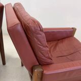Fauteuils lounge danois vintage en palissandre et cuir. Années 1960.