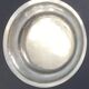 Circular silver-plated metal dish signed ercuis