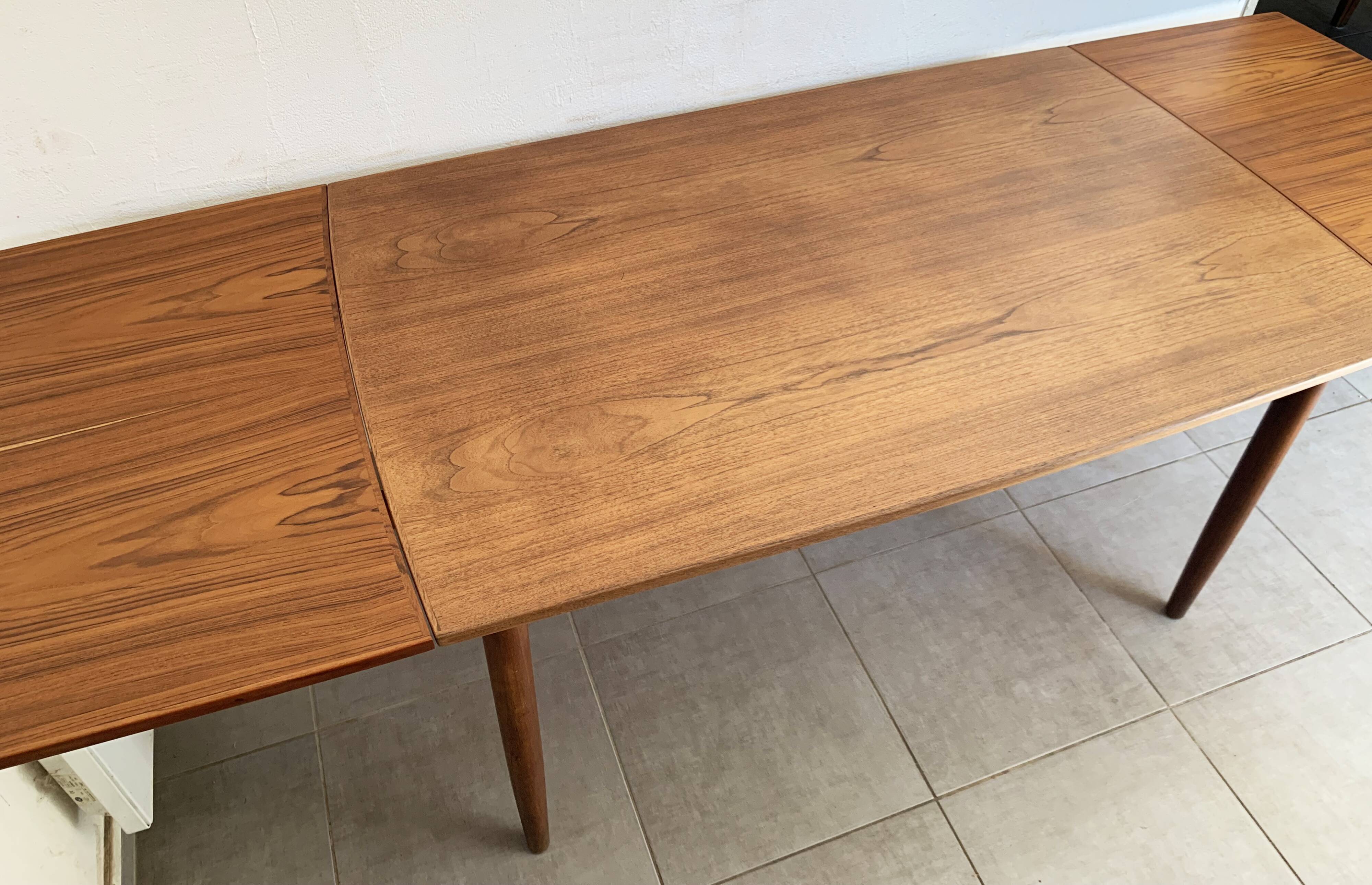 Vintage Danish dining table from the 60s extendable teak