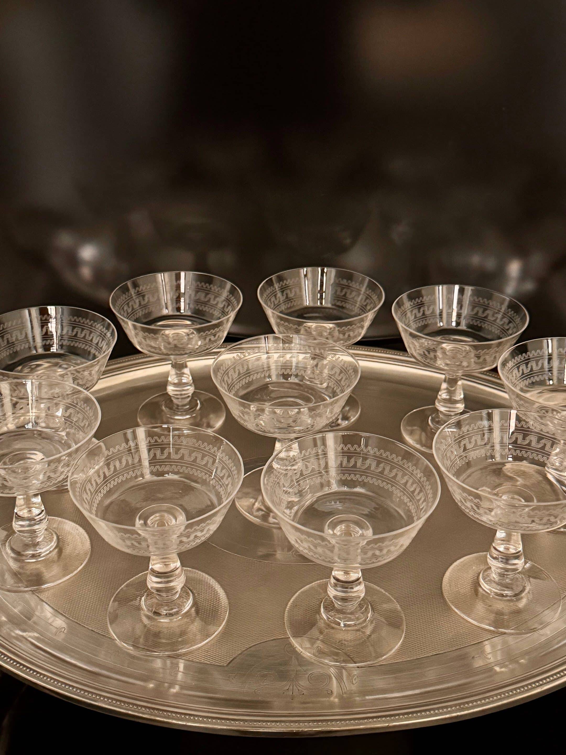 Baccarat, set of 10 engraved crystal champagne glasses from 1900.