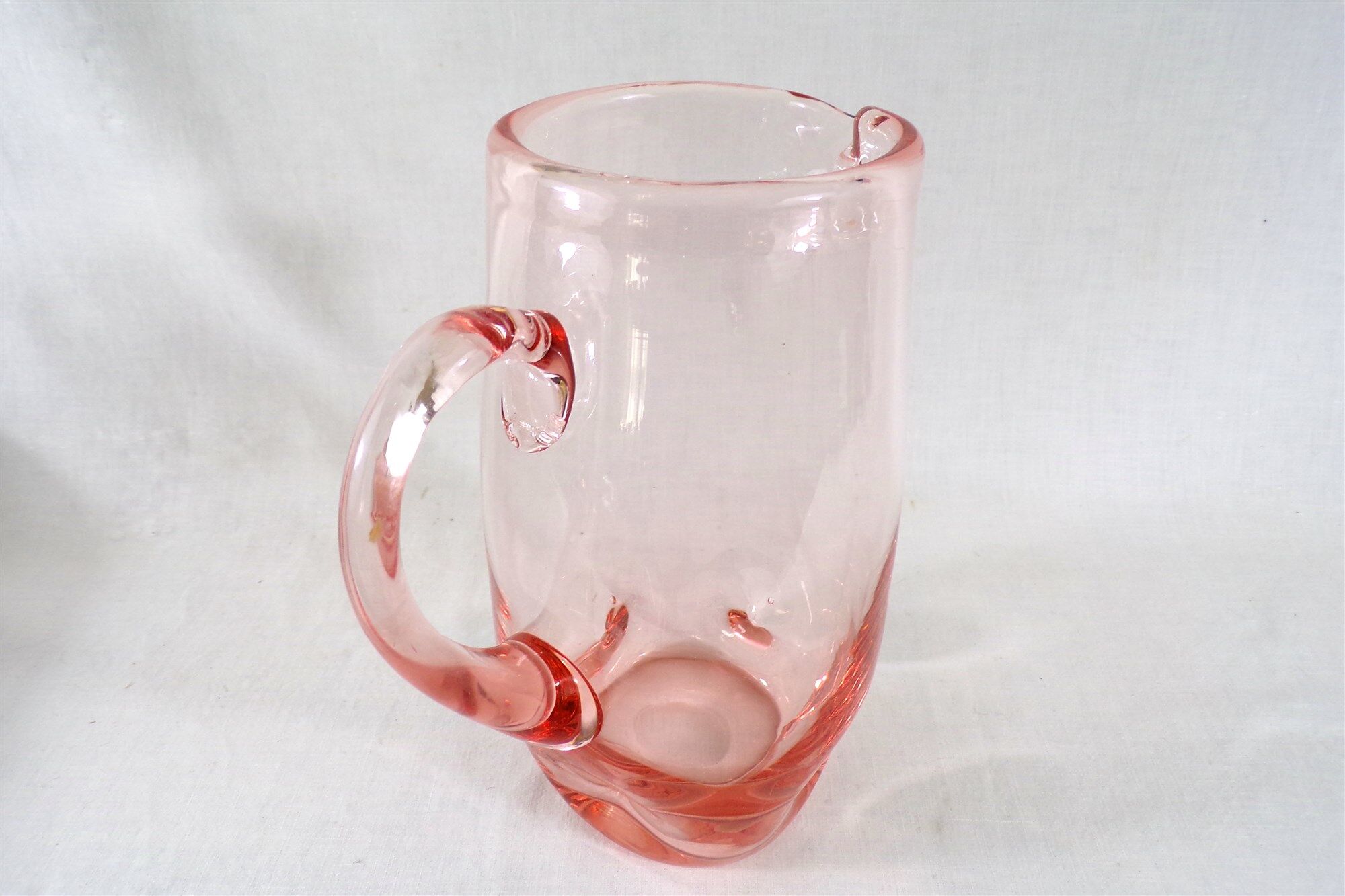 Antique pitcher made of blown glass